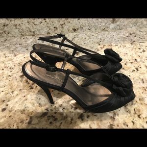 Black heeled shoes with rose embellishment size 10